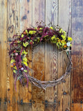 Grapevine wreath with dried flowers