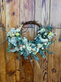 Grapevine wreath with dried flowers