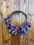 Grapevine wreath with dried flowers